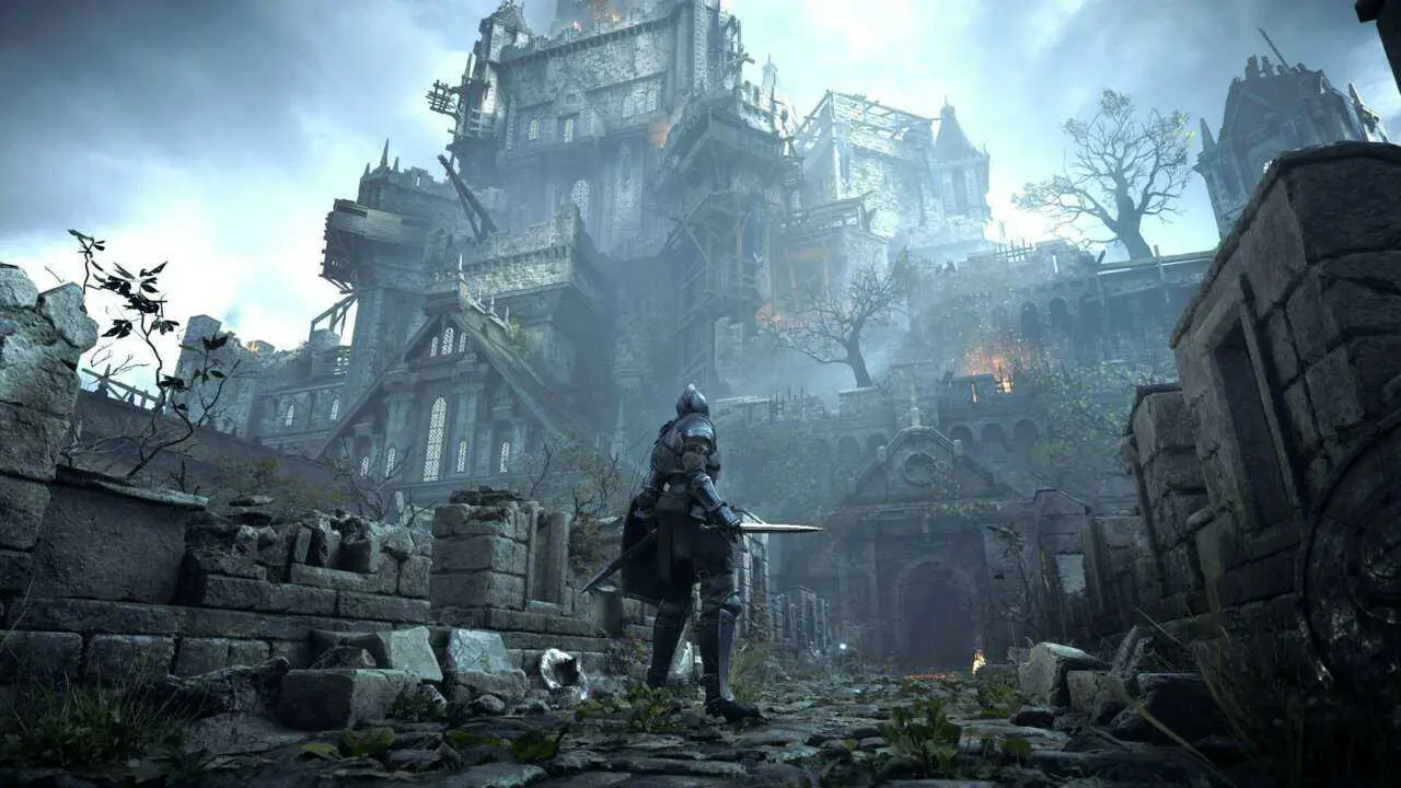 Imagem do jogo Demon's Souls, da Bluepoint Games, com o protagonista olhando para uma grande estrutura ao fundo