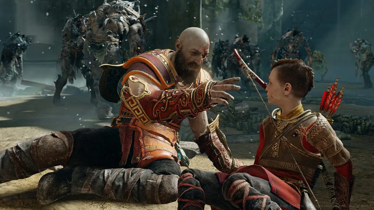 Kratos e Atreus rodeados por monstros em God of War.