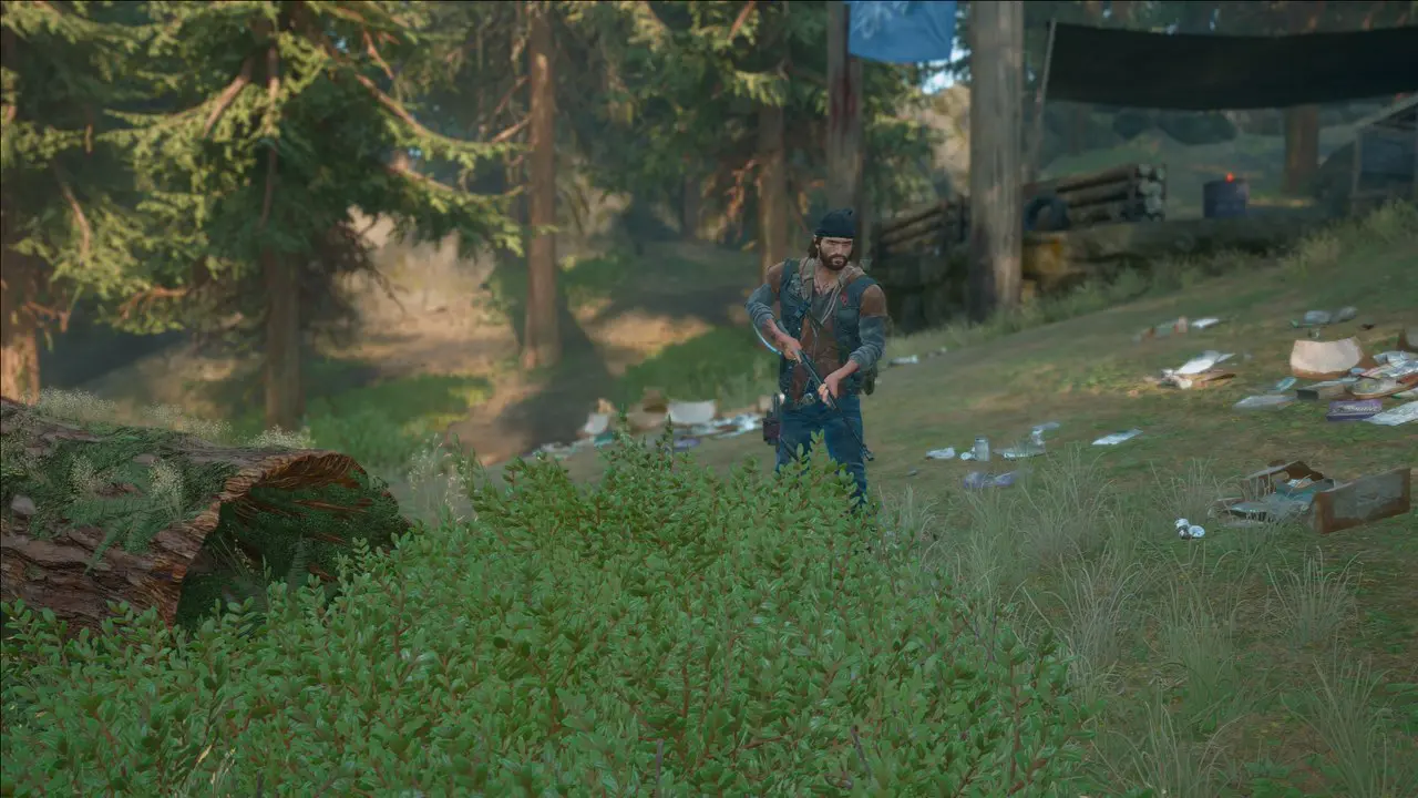 Imagem do protagonista de Days Gone para PC segurando uma arma em uma floresta