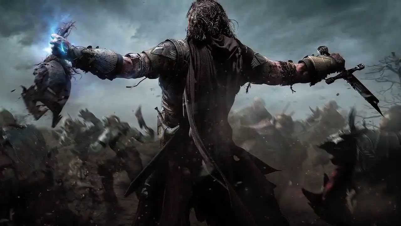 Protagonista de Sombras de Mordor segurando uma espada e uma cabeça de orc