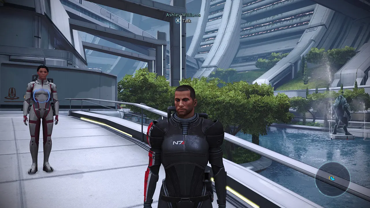 Personagens do jogo Mass Effect Legendary Edition, um homem e uma muher,parados em cima de uma ponte.