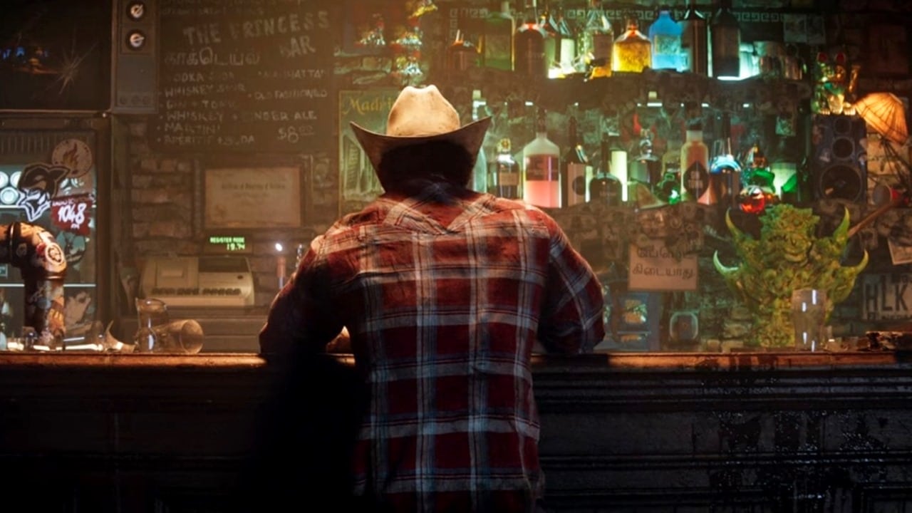 Logan sentado em um bar em Marvel's Wolverine.