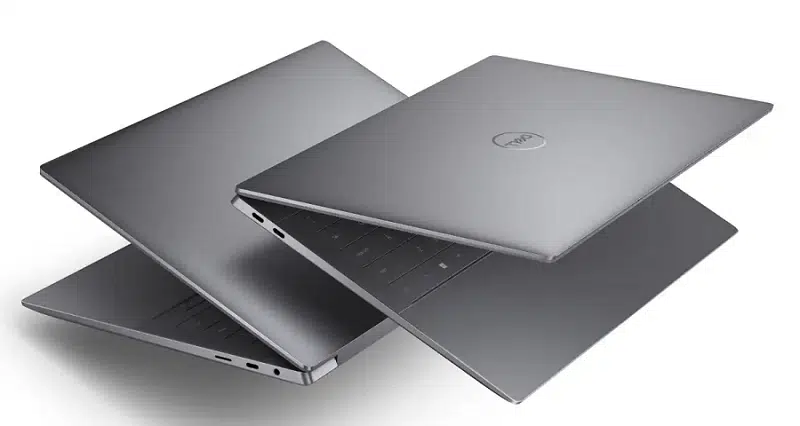 Dois notebooks Dell XPS com a tampa levemente abaixada, destacando seu design exterior.