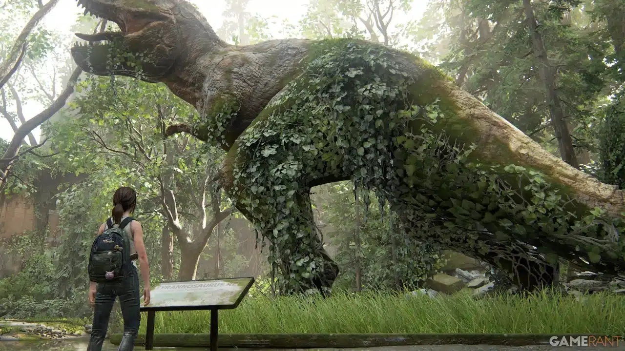 menina em um parque florestal olhando para uma grande escultura de dinossauro