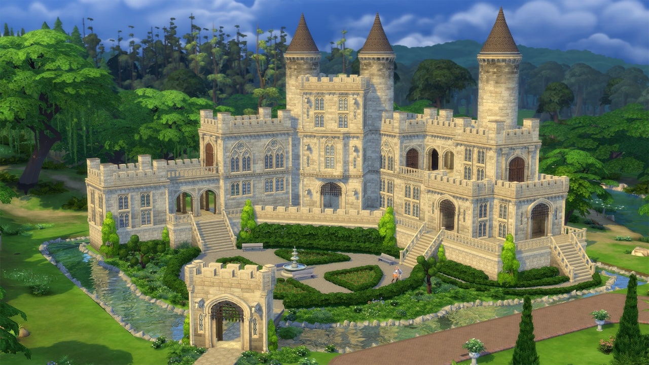 grande castelo medieval repleto de torres e castelos em meio a uma floresta arborizada