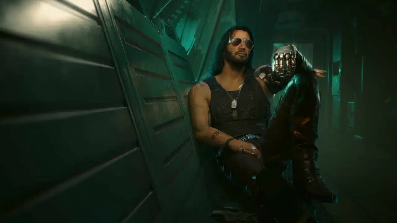 homem com oculos e braço cibernetico em cyberpunk 2077
